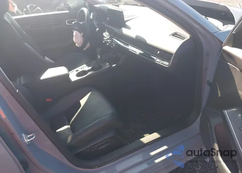 2022 Honda Civic Touring z USA, uszkodzony, nr VIN 2HGFE1F98NH320484